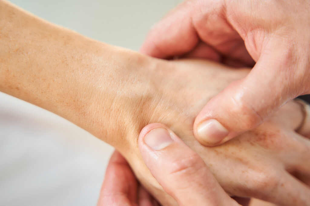 Hand massage during a full body massage therapy session